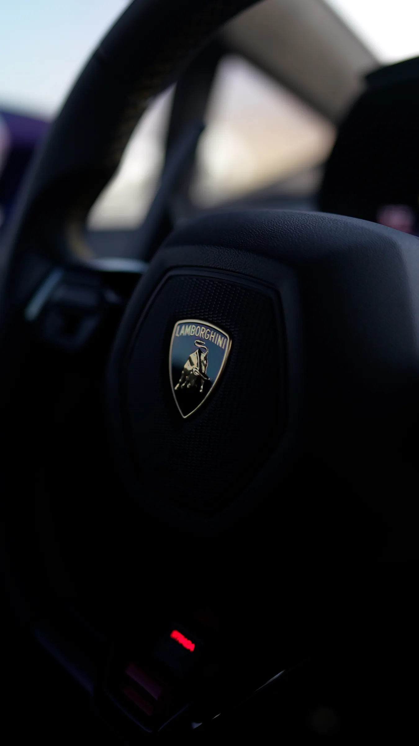 Lamborghini bull badge on Huracán steering wheel
